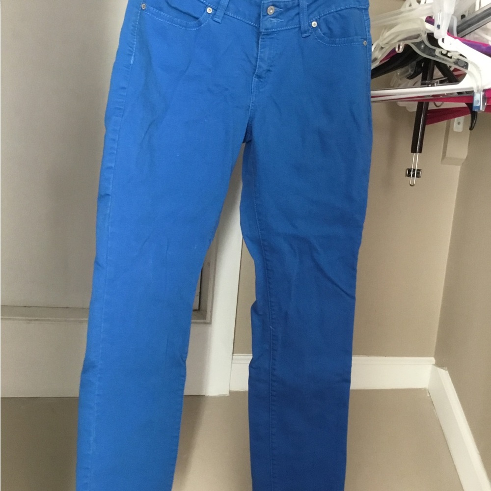 4 pairs Gloria Vanderbilt jeans size 10. Red, royal blue, turquoise, purple.